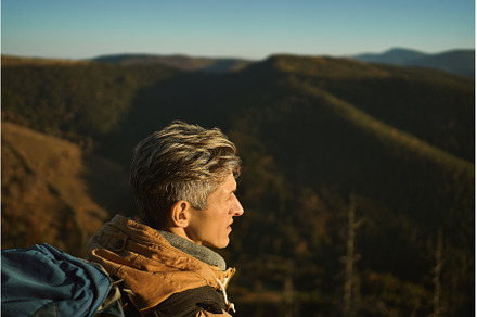 Close up face of tourist man looking, a Nature Photo by vitaliymateha photography