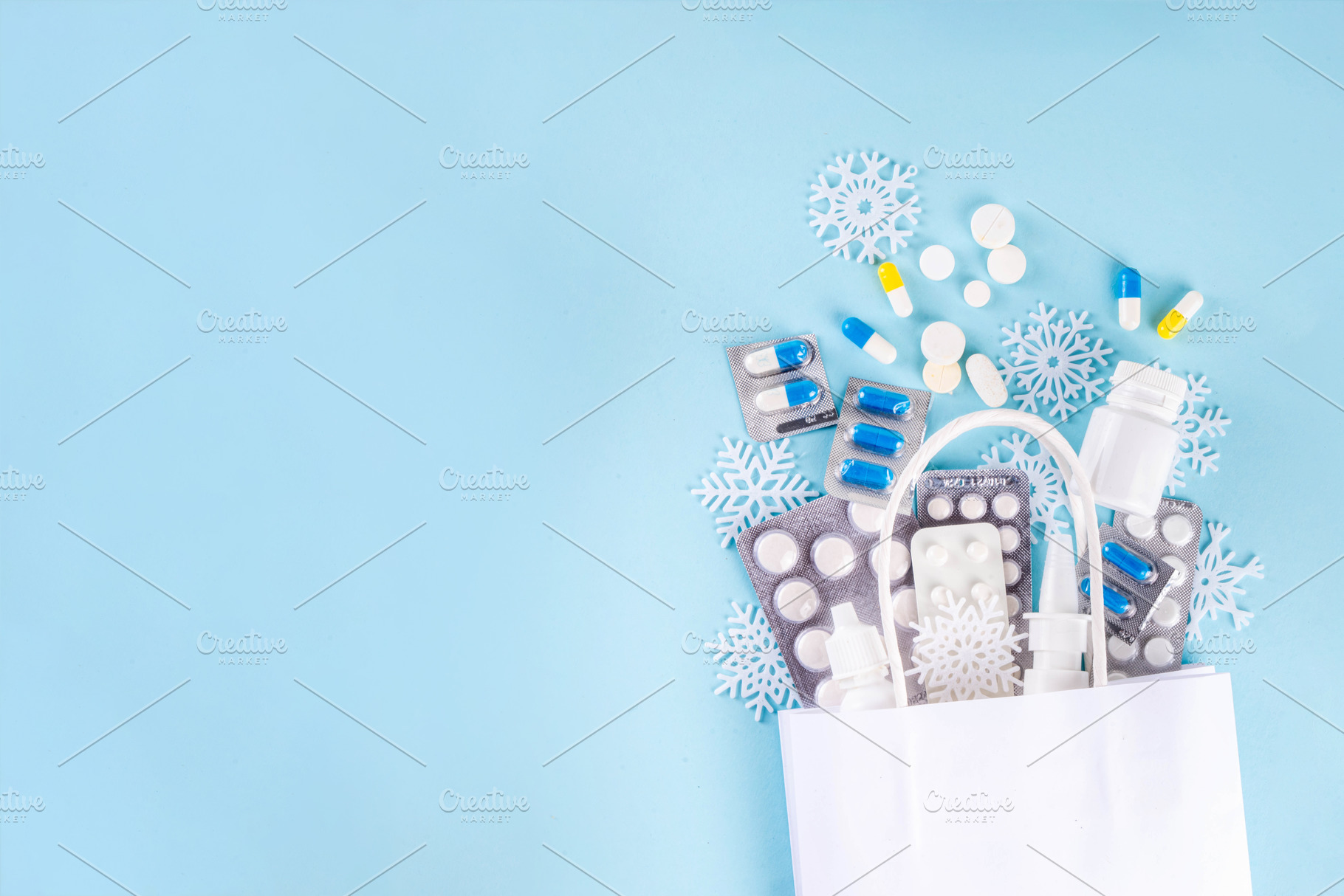 Shopping bag with different pharmacy pills, Seasonal winter medi, a Health & Medical Photo by Rimma