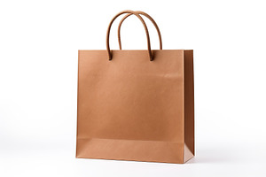 Brown paper shopping bag on white background, a Beauty & Fashion Photo by AlyaAnd