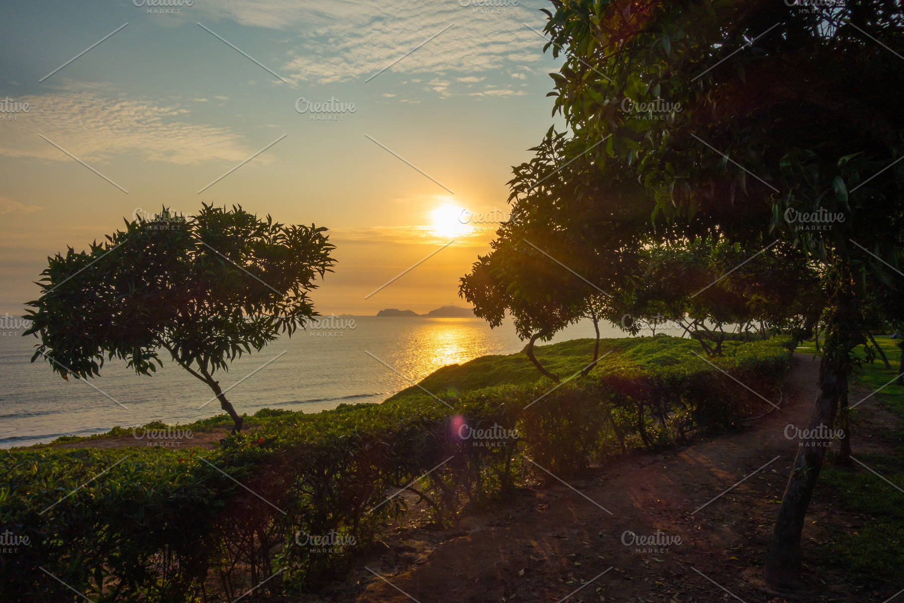Sunset over the bay and Isla San Lorenzo in Lima, Peru, a Nature Photo by GoodGoods