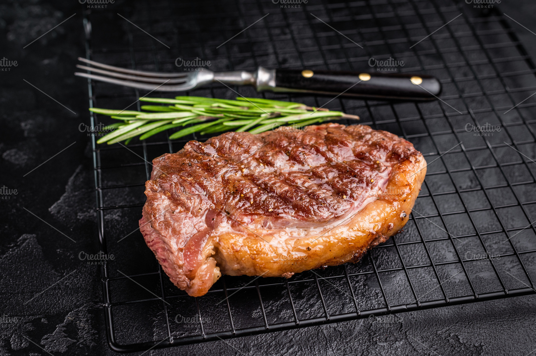 Juicy grilled striploin New York steak with perfect grill marks,, a Food & Drink Photo by composter-box@mail.ru