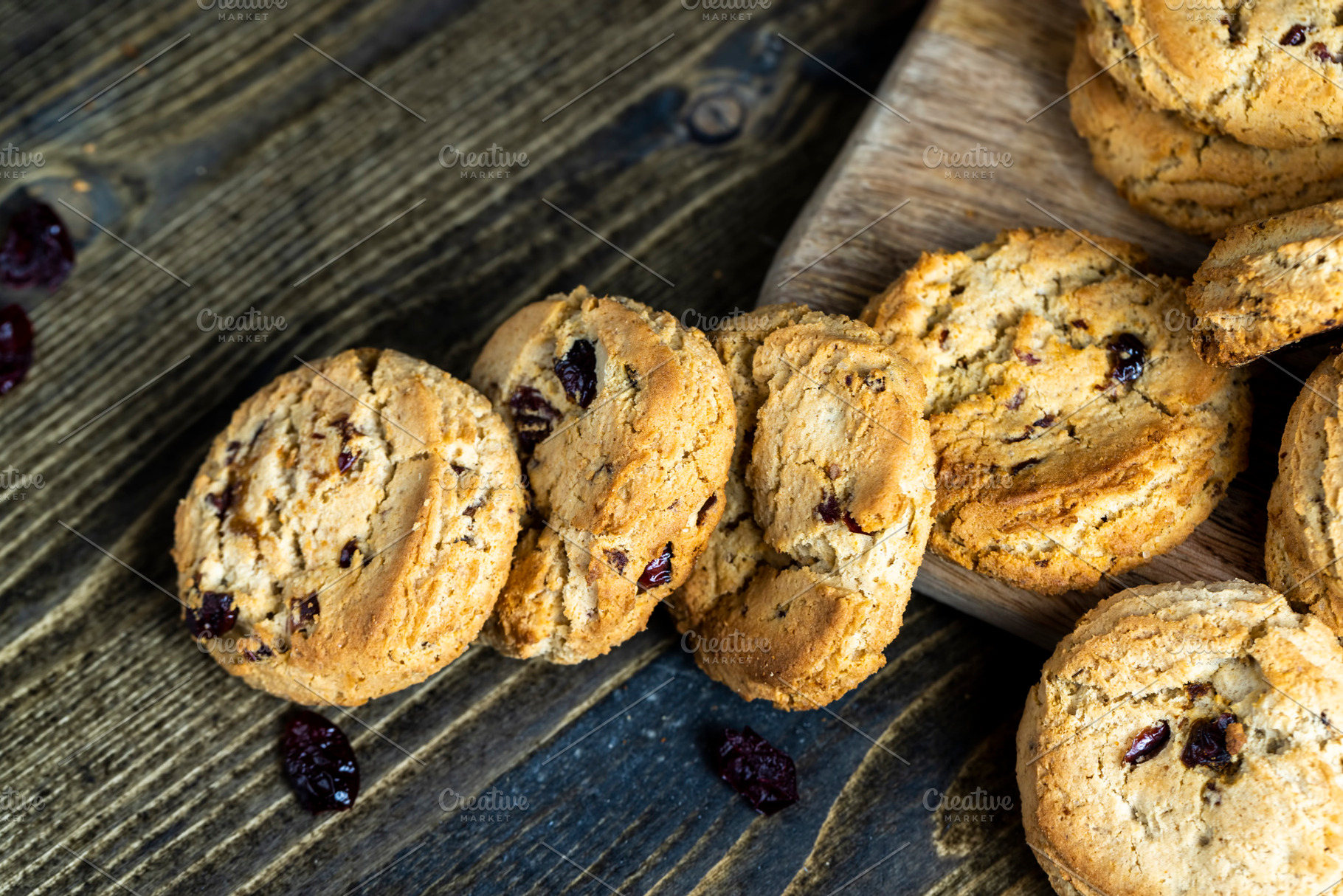 delicious dried cookies made of high-quality flour with dried red cranberries o, a Photo by MyPhotos