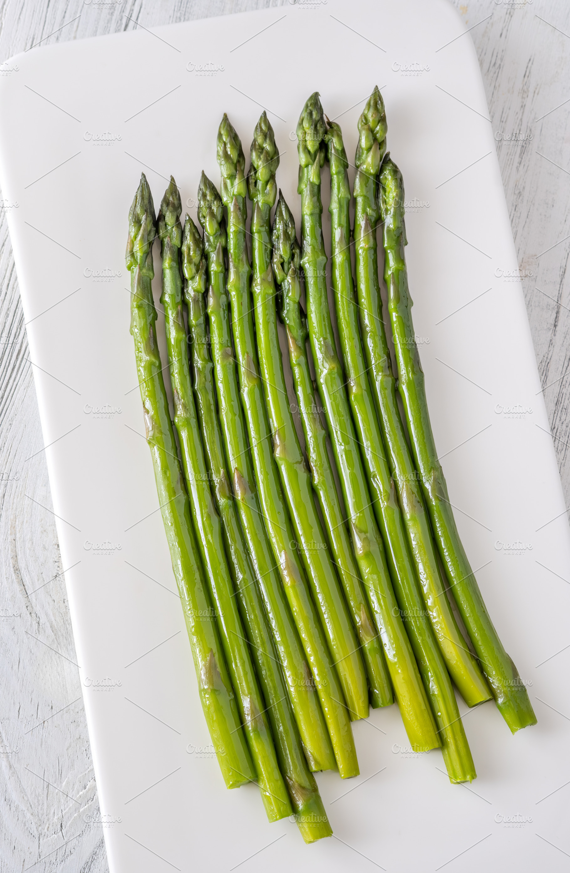 Tender boiled asparagus arranged nea, a Food & Drink Photo by Alexander Prokopenko