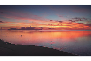 Man enjoying amazing sunset over, a Nature Photo by Goinyk