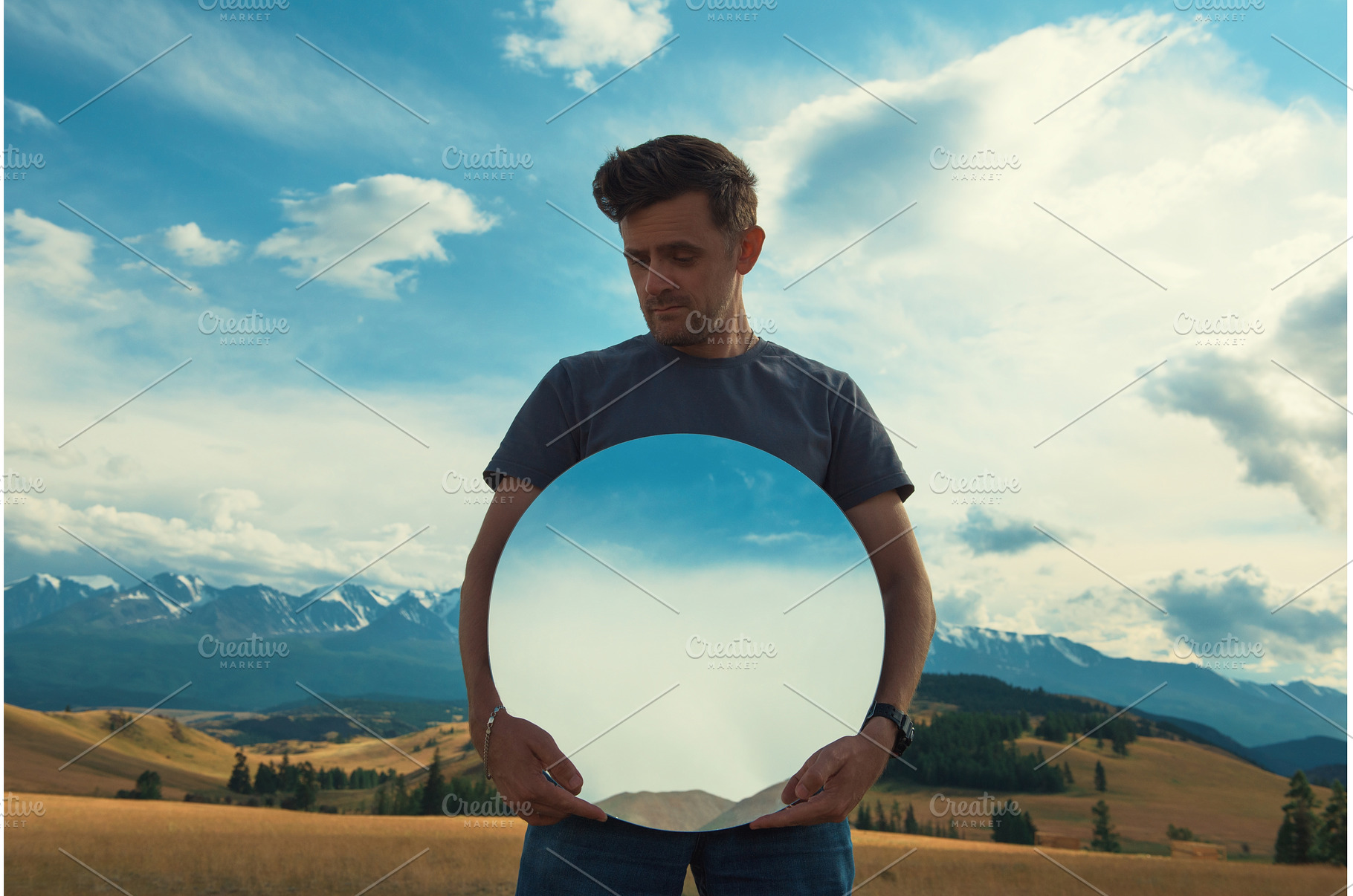 Man standing in in summer Altai, a Person Photo by Jan Jack Russo Media