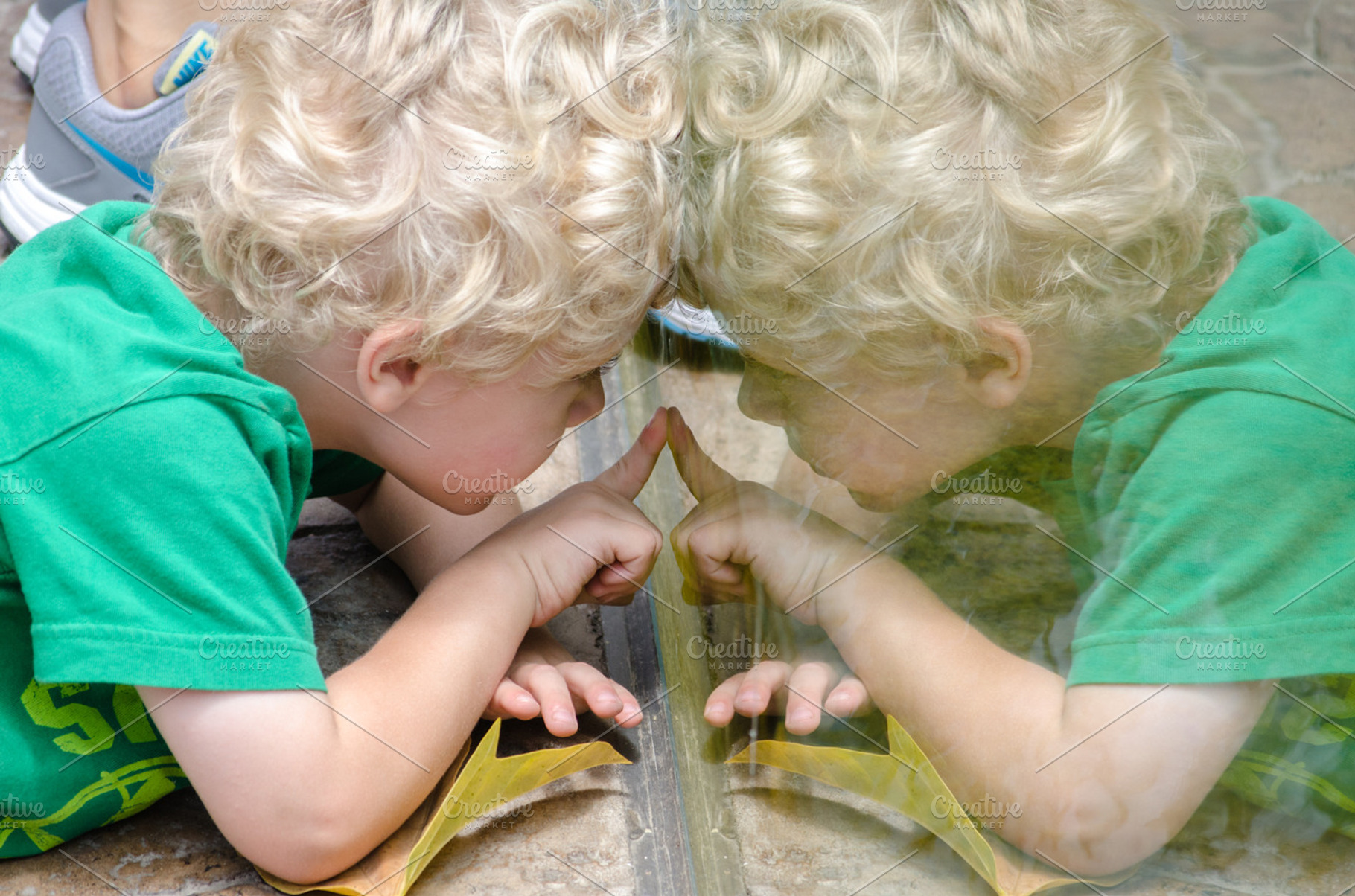 Child Reflected, a Person Photo by Catchline Studios