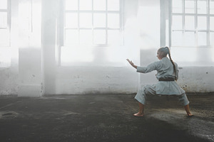Female practicing karate featuring karate, martial, and art