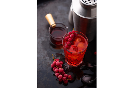 Alcoholic cocktail with red currant, a Food & Drink Photo by Yulia Furman