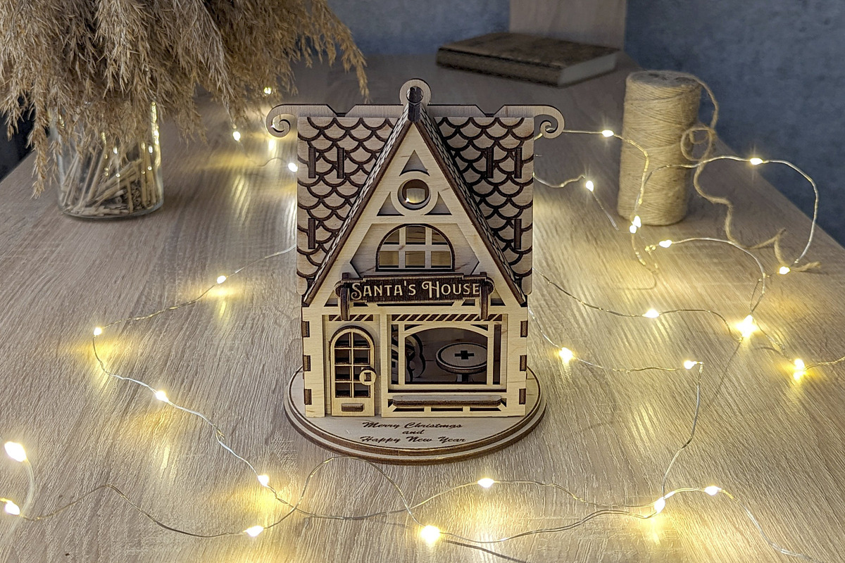 Santa's Christmas House - Laser Cut, an Object Graphic by VectorPainter (Photo 2 of 9)