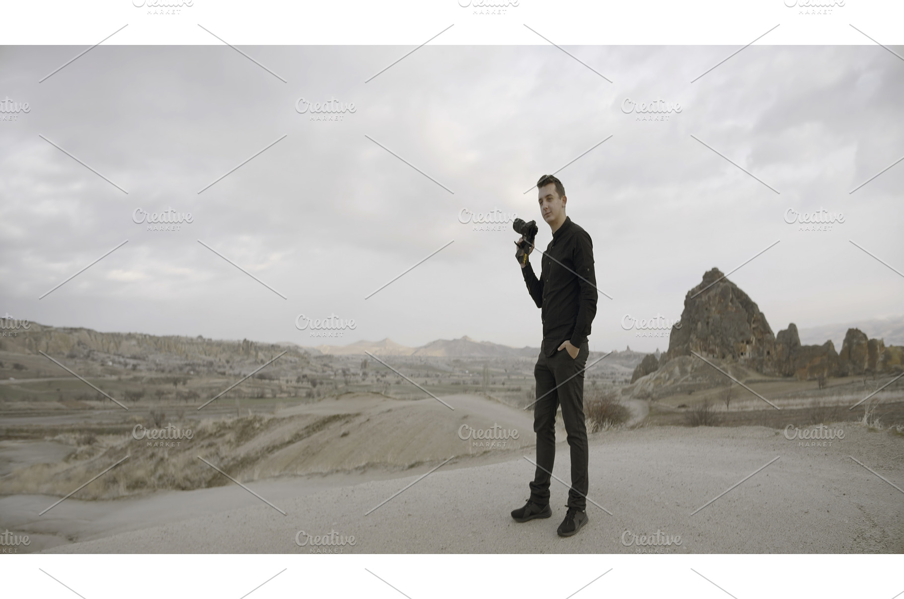 Young male photographer with a, a Nature Photo by Media Whale Stock