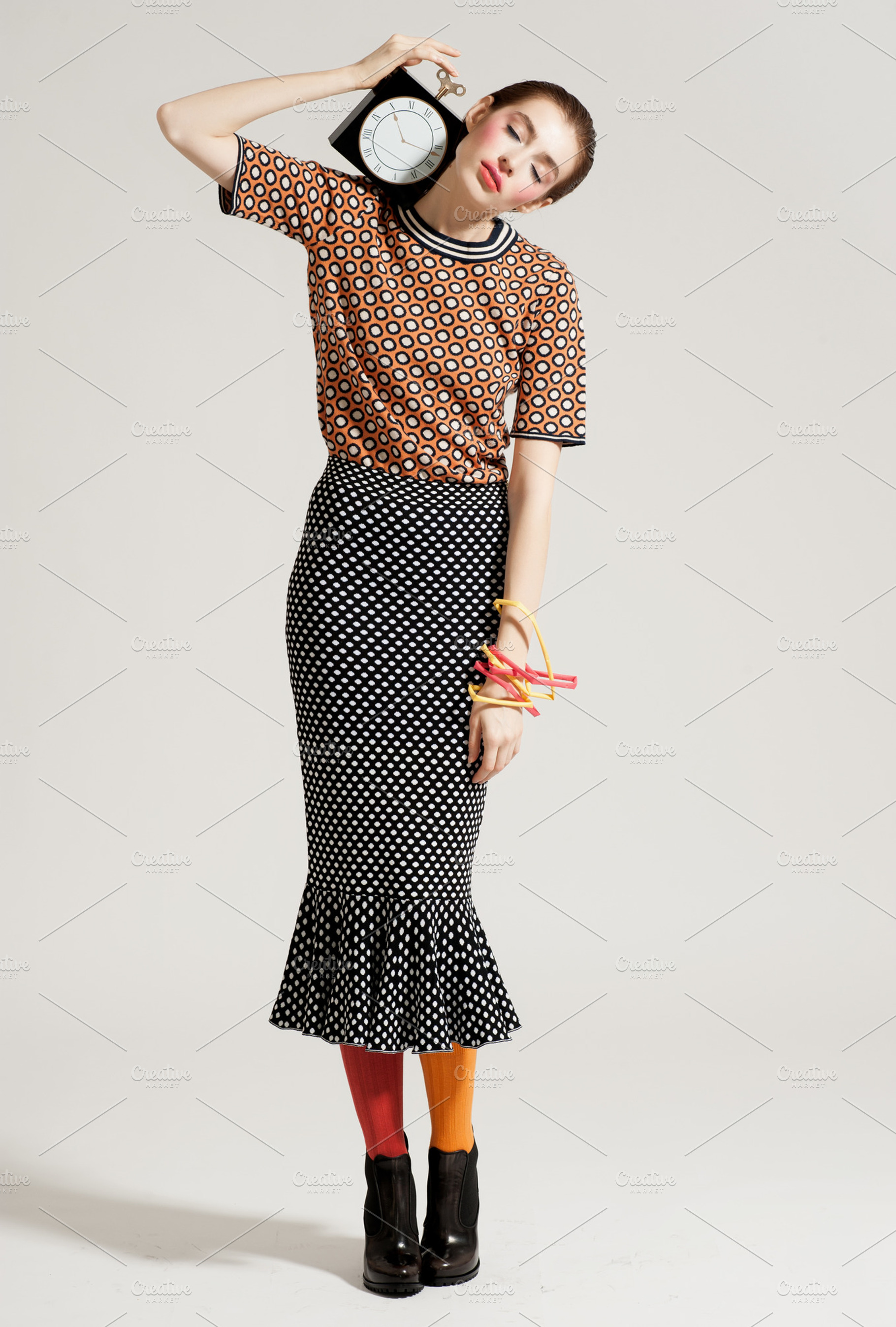 Fashion model pose on light background containing fashion, model, and studio, a Beauty & Fashion Photo by Serovphoto
