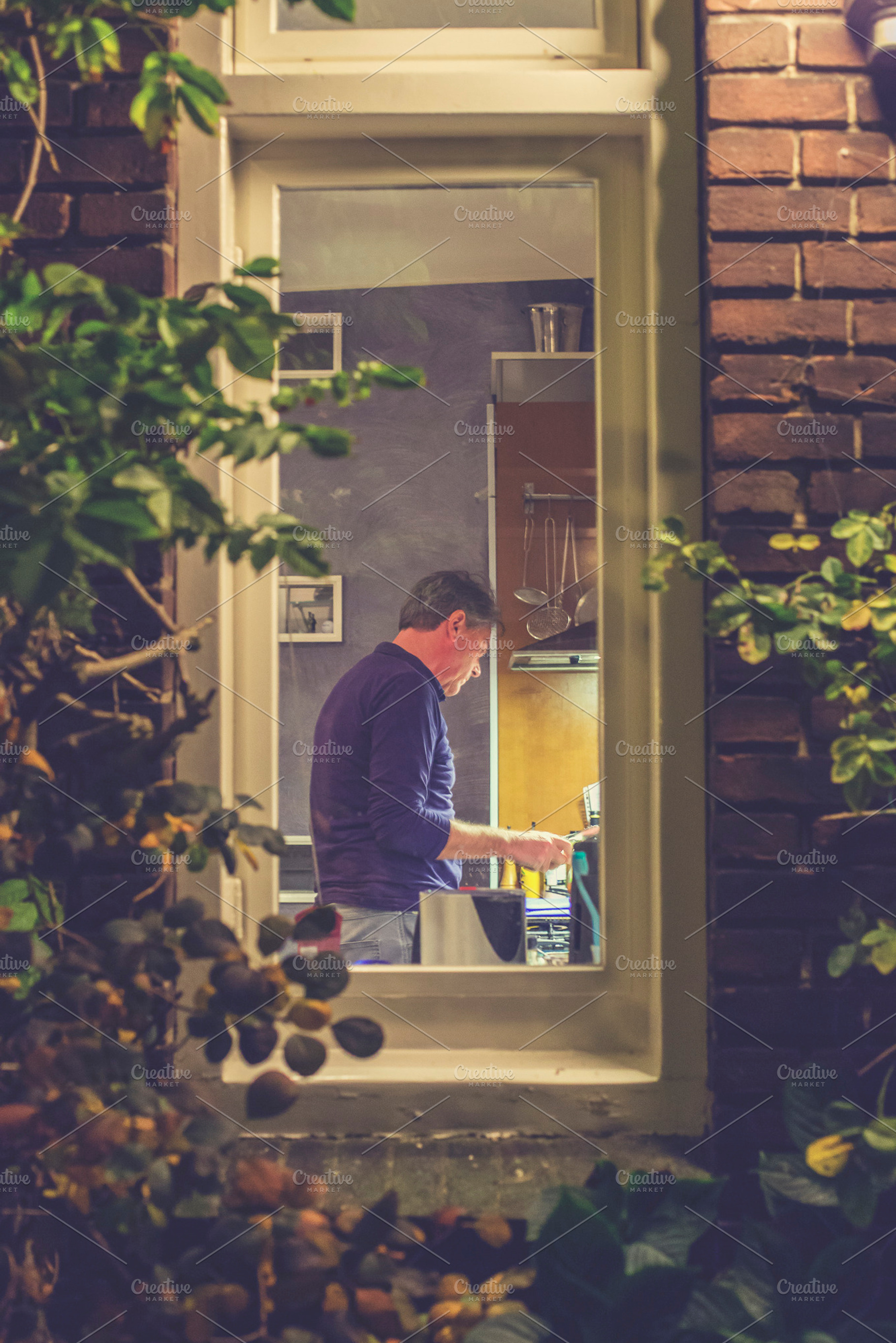 Looking at a man cooking, a Food & Drink Photo by Patricia Hofmeester