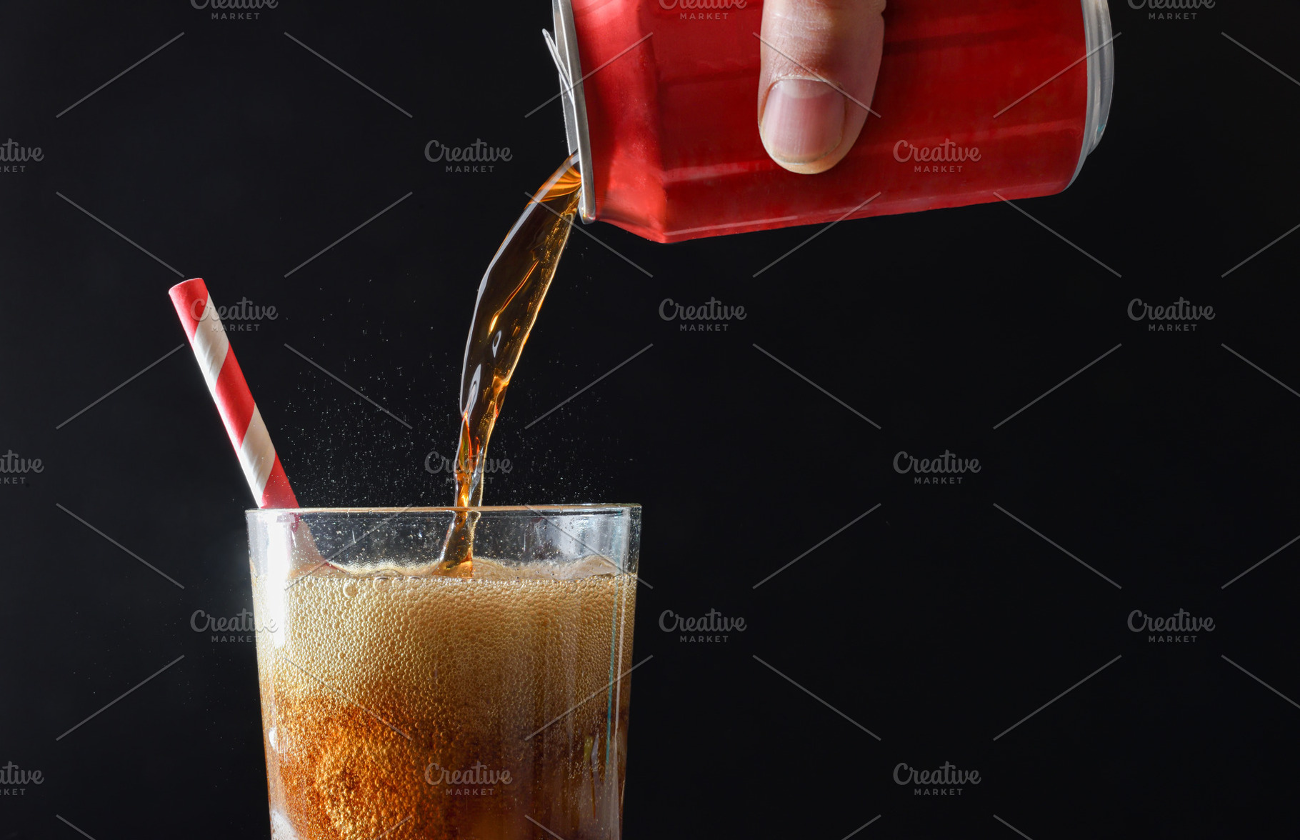 Person filling glass with cola from a can isolated background, a Food & Drink Photo by Davizro's Market