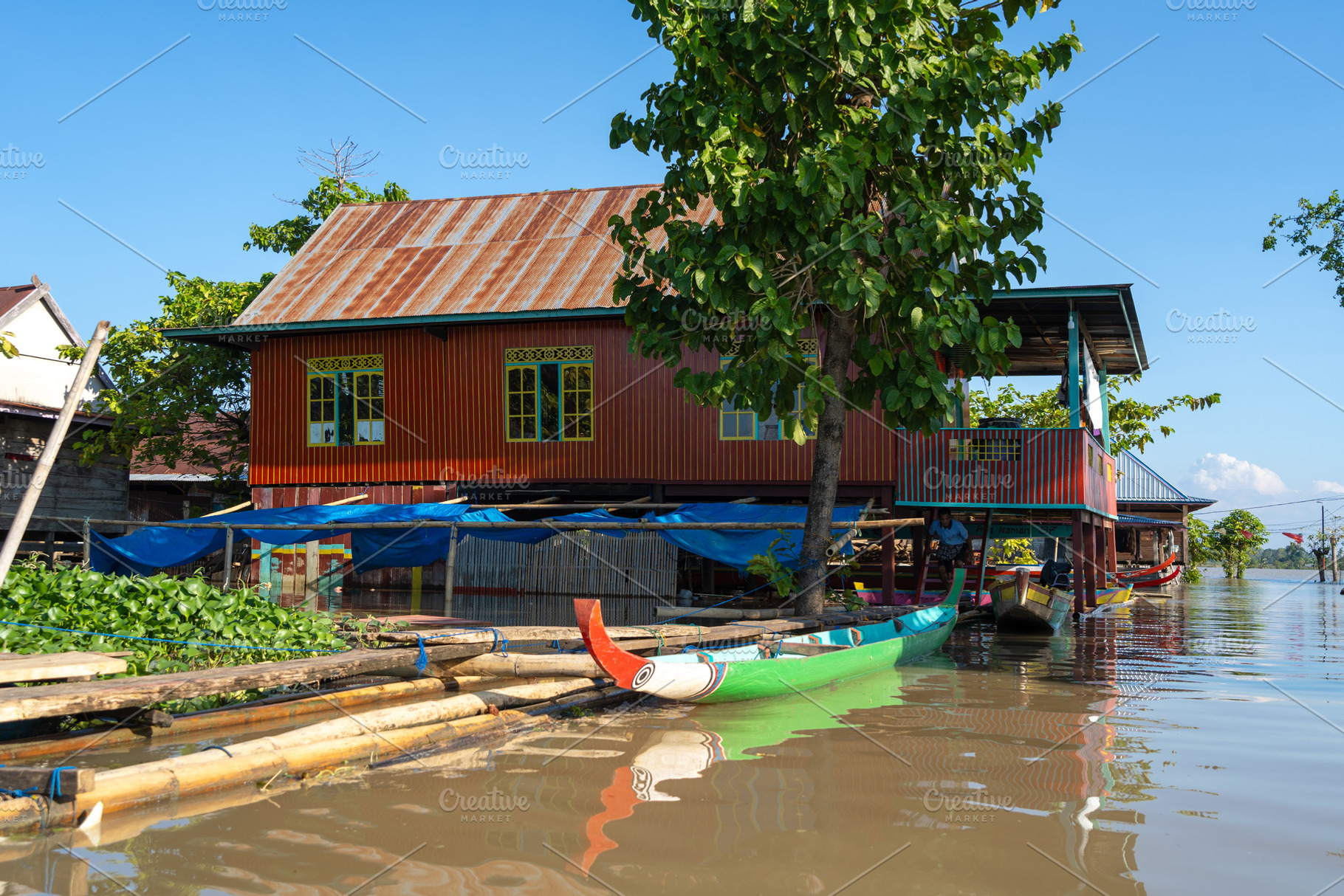 Traditional Bugis floating houses on Lake Tempe, Sulawesi, Indon, an Architecture Photo by GoodGoods