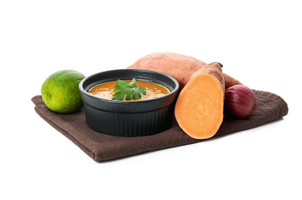 Concept of tasty food, sweet potato puree, isolated on white bac, a Food & Drink Photo by AtlasStudio