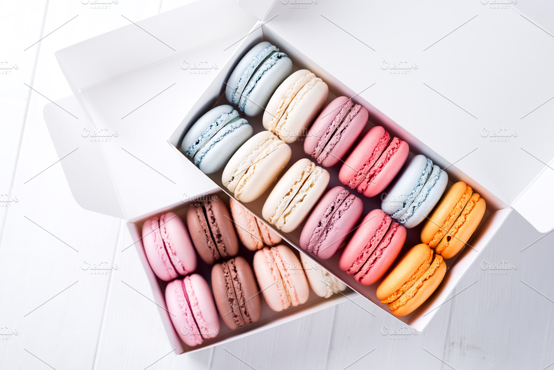 Colorful macaroons sweet macarons featuring macaroon, sweet, and meringue, a Food & Drink Photo by YuMyart