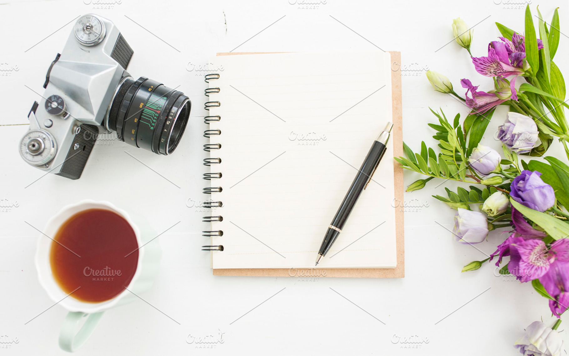 Flat lay desk with tea and flowers containing flatlays, desk, and top, a Beauty & Fashion Photo by Izdebska