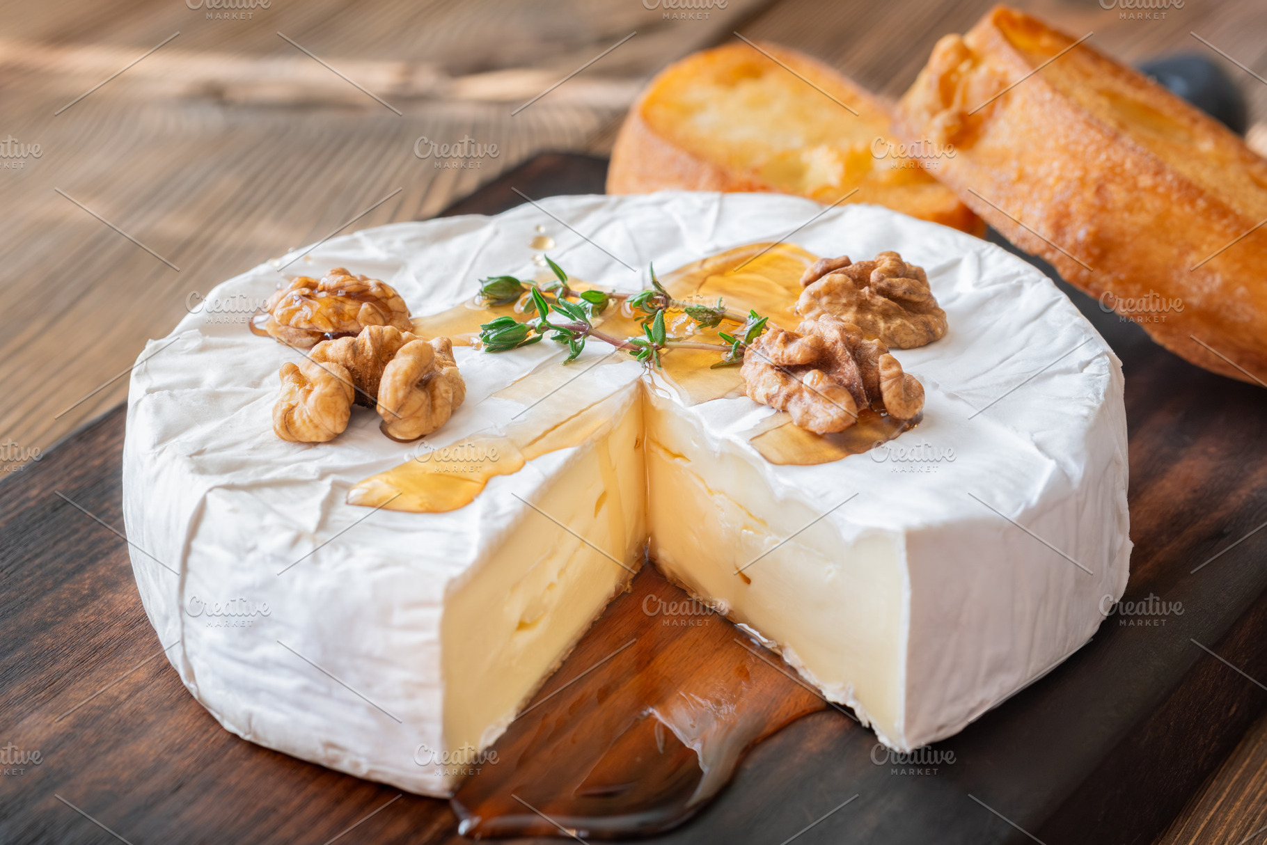 Creamy Camembert Cheese With Maple Syrup Walnuts And Toasted Bag, a Food & Drink Photo by Alexander Prokopenko