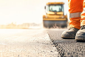Road construction worker with heavy, a Photo by Dvoevnore photos