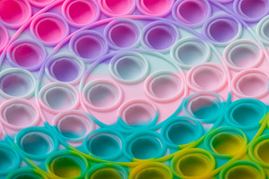 Colorful Pop It Fidget Toy Close-Up, a Background Photo by Ales Munt
