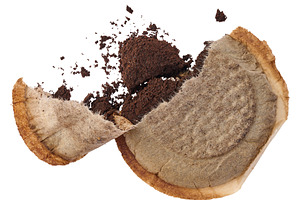 Torn round coffee pod or single serving of ground coffee wrapped, a Food & Drink Photo by ndanko