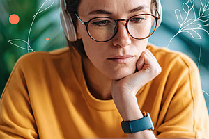 Young woman wearing headphones focused on laptop in cozy workspace with plants, a Person Photo by AlyaAnd