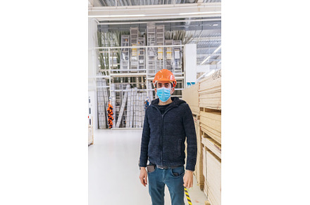 A man in a hardware store. Sells, a Person Photo by yanadjana