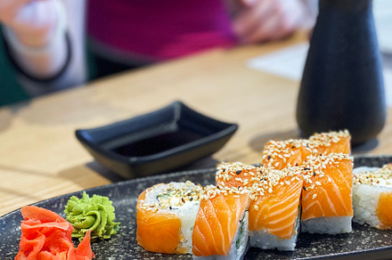 Eating roll sushi, a Food & Drink Photo by Olena Rudo