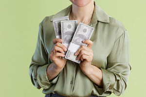Abundance: Holding Wealth in Green, a Business Photo by Alliance Images