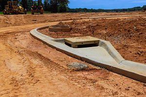 Construction site features concrete, an Industrial Photo by Ungvar Studio
