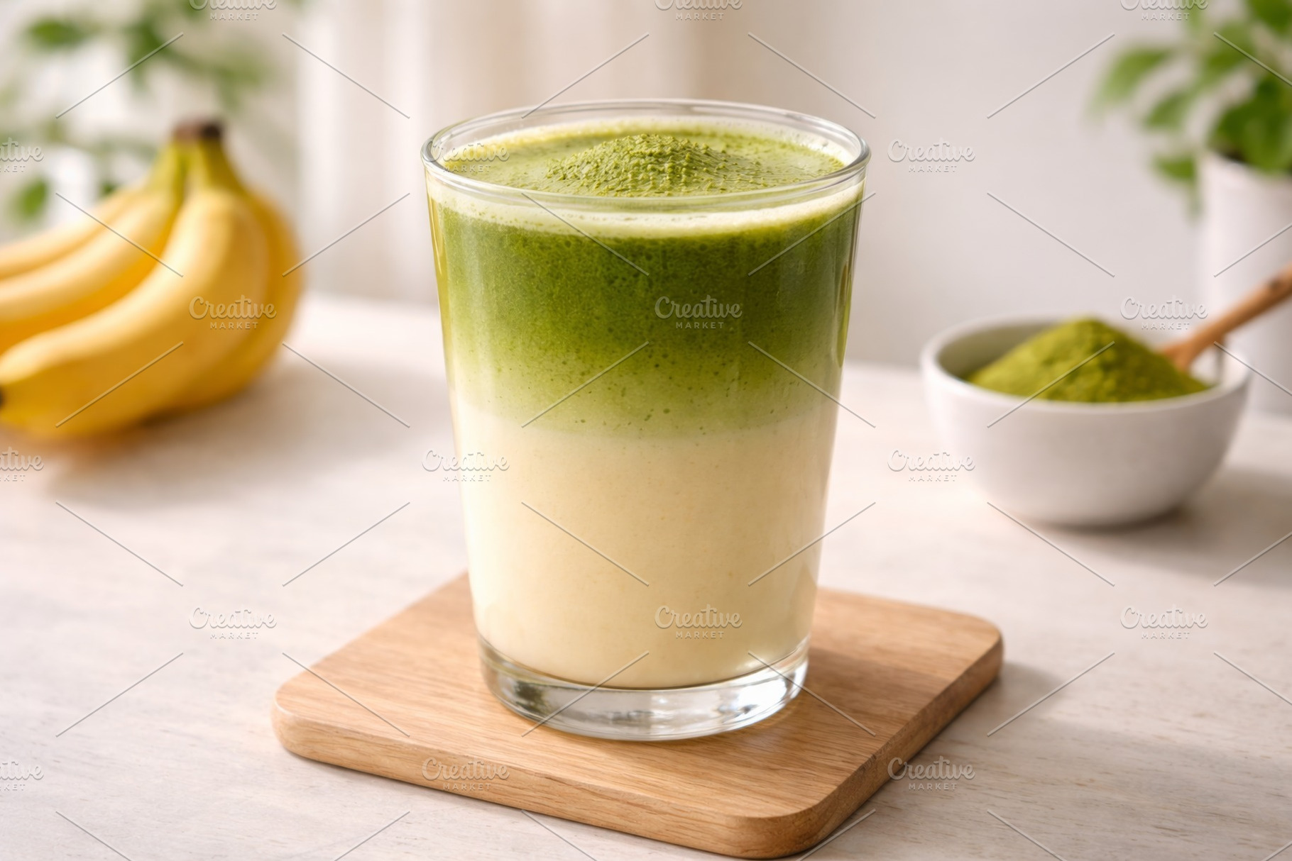 Banana matcha smoothie in a glass on, a Photo by Dvoevnore photos