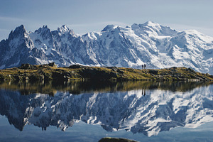 Couple on a lake in the alps containing mountain, view, and hike, a Nature Photo by Mukuko Studio