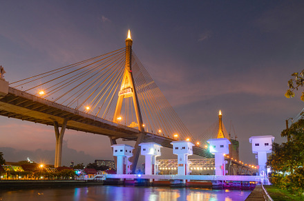stunning Bhumibol Bridge, illuminated at dusk, showcases its architectural beau, an Architecture Photo by a454