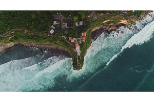 Aerial view of Uluwatu Temple during, a Nature Photo by Goinyk
