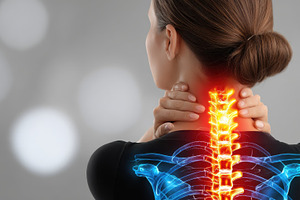 Woman with neck pain spinal pain hig, a Photo by Pixeness Studio