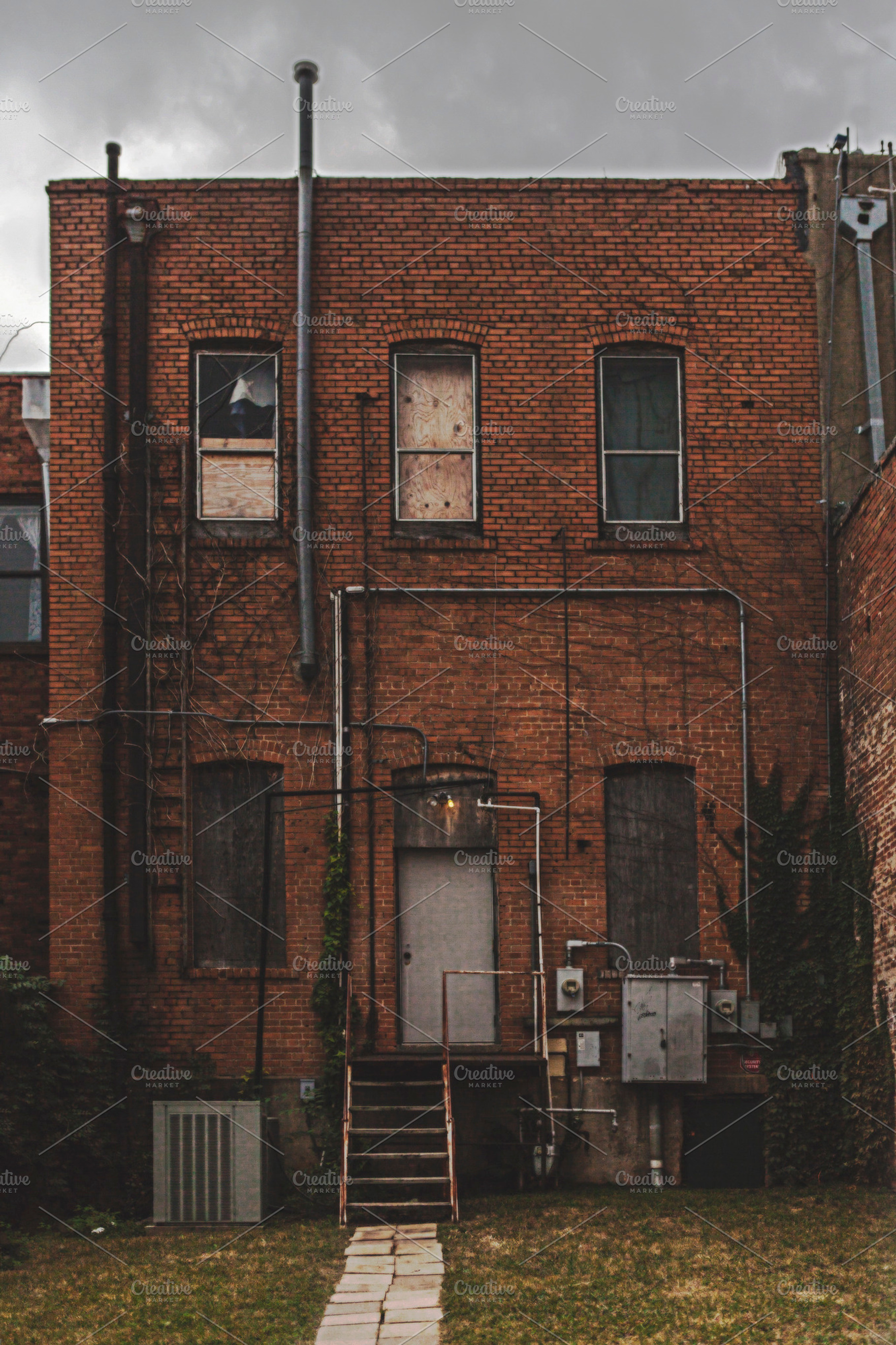 Photo Of A Building In An Old Alley