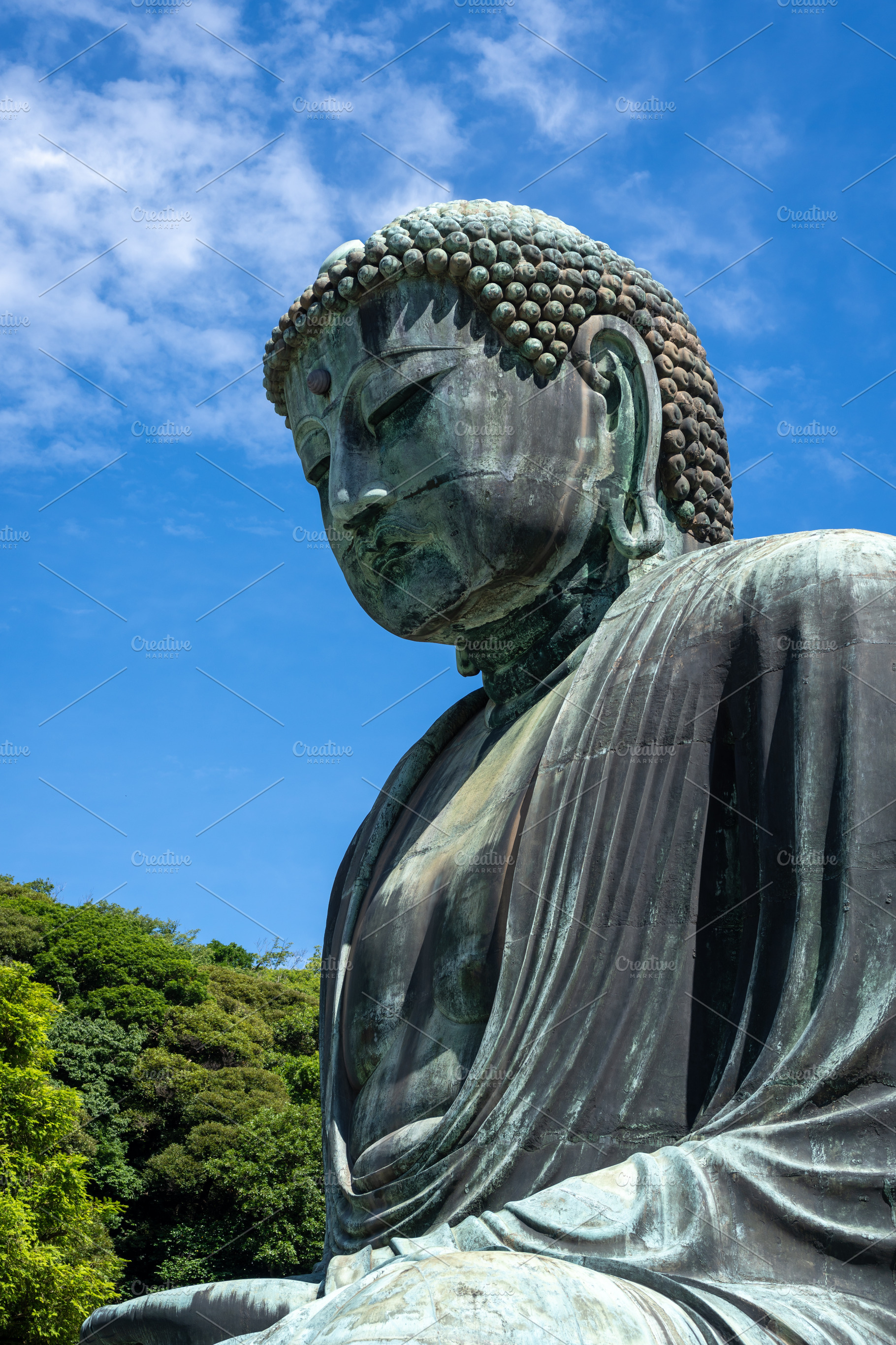 Great Buddha statue close-up view at Kotoku-in temple in Kamakur, an Architecture Photo by GoodGoods