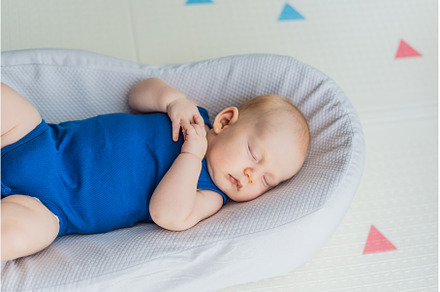 Chubby 3-month-old baby peacefully