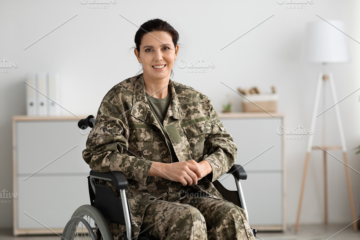 Rehabilitation Programs For Veterans. Portrait Of Happy Military Woman Sitting, a Photo by Prostock-Studio (Photo 1 of 2)
