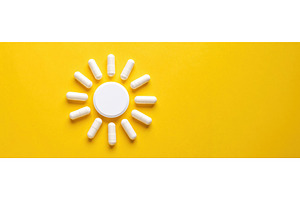 Vitamin D supplement shaped as a sun, a Health & Medical Photo by Igor Tichonow