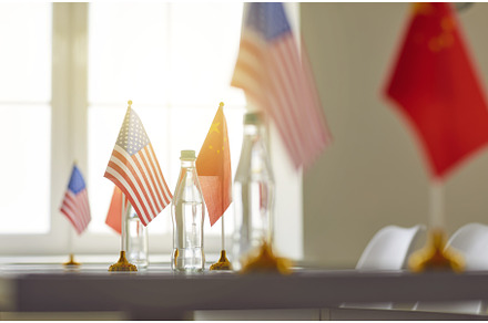 Flags of China and USA on table, a Business Photo by StudioRomantic