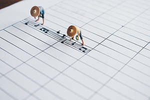 Miniature people containing background, white, and miniature