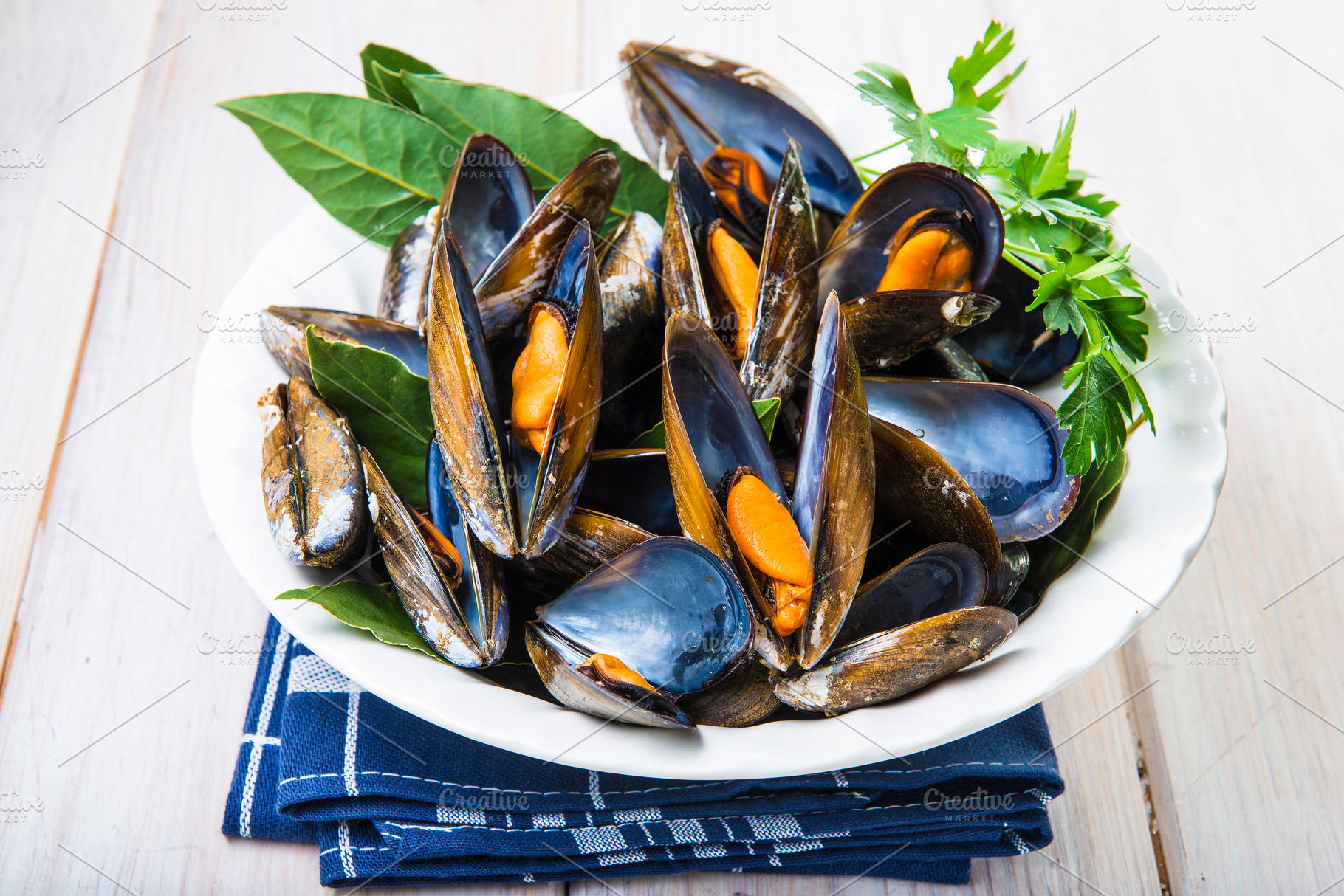 Steamed mussels containing mussel, seafood, and shellfish, a Food & Drink Photo by Angel Simon Photography