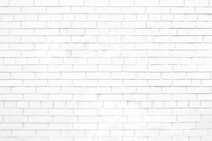 Painted white brick wall.