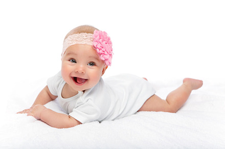 Happy beautiful baby girl in white featuring infant, isolated, and cute