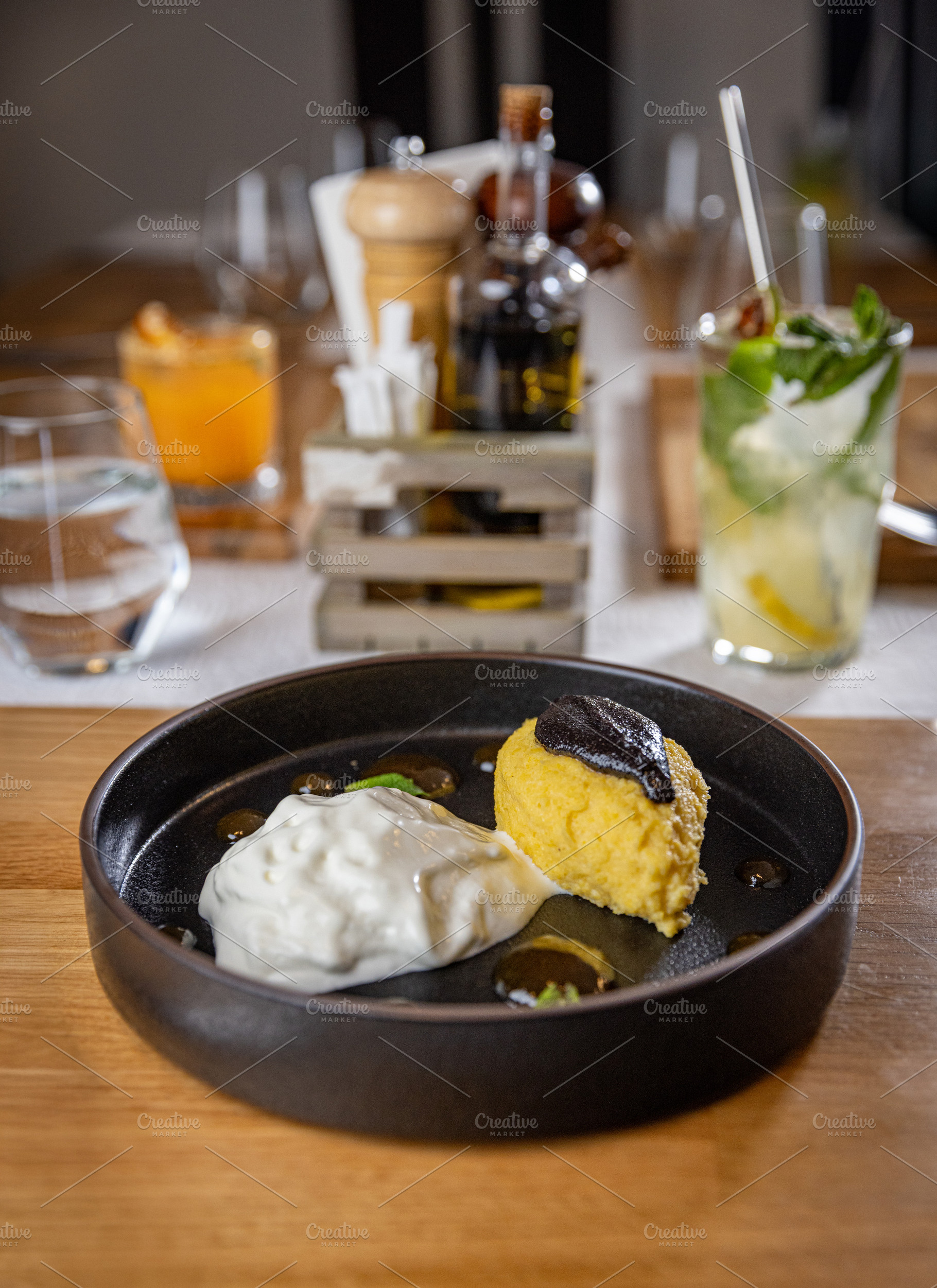 Creamy polenta with burrata cheese, a Photo by Grafvision photography