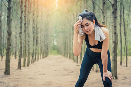Asian beauty woman wiping the sweat in forest. Towel and sweat e, a Sports & Recreation Photo by Ministocker