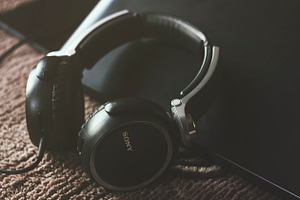 Headphones Inclined on Laptop