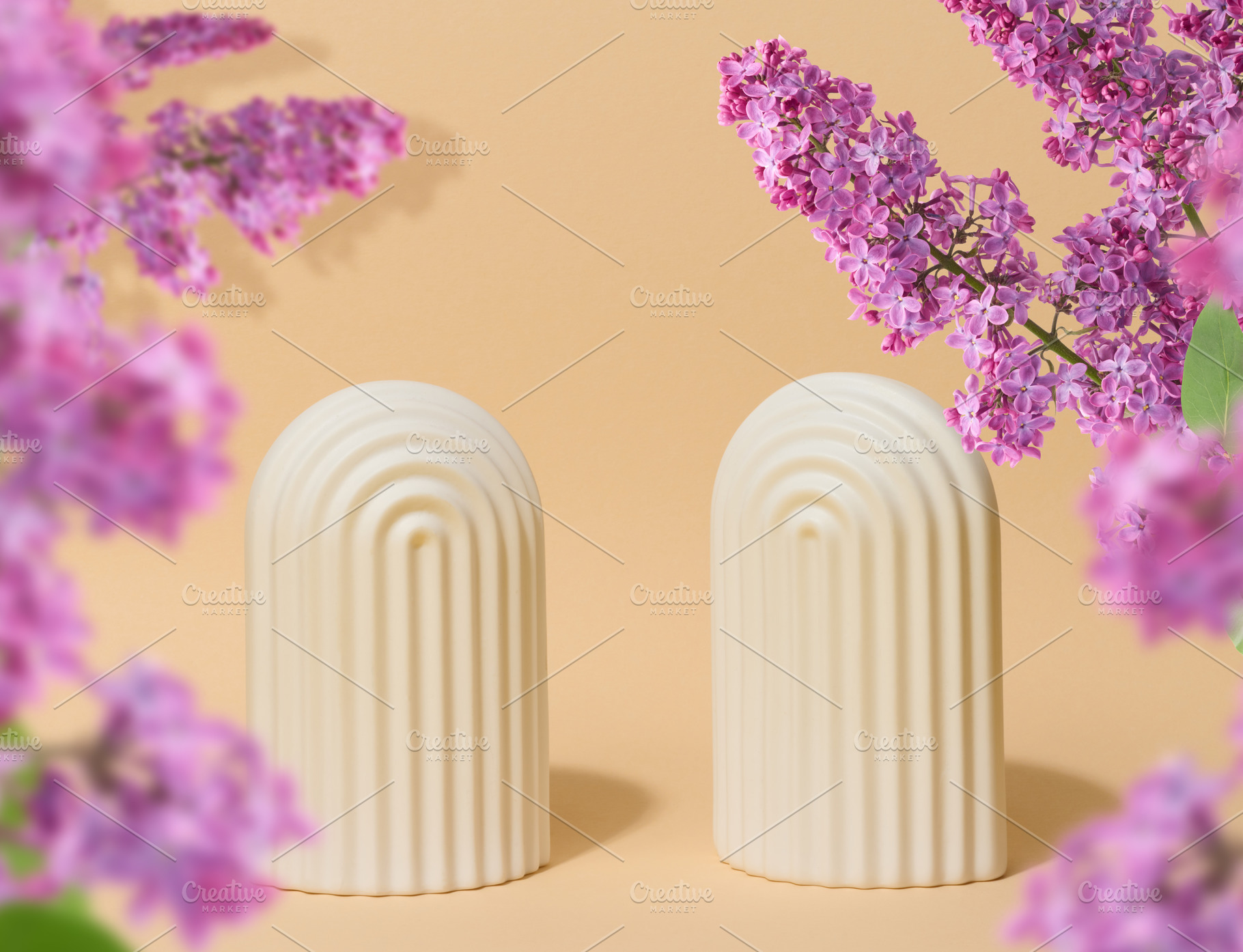 Two white decorative arches with a relief surface, on a beige su, a Background Photo by ndanko