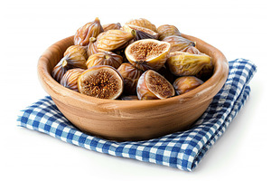 Dried figs fruit in bowl isolated on white background, a Food & Drink Photo by AlyaAnd